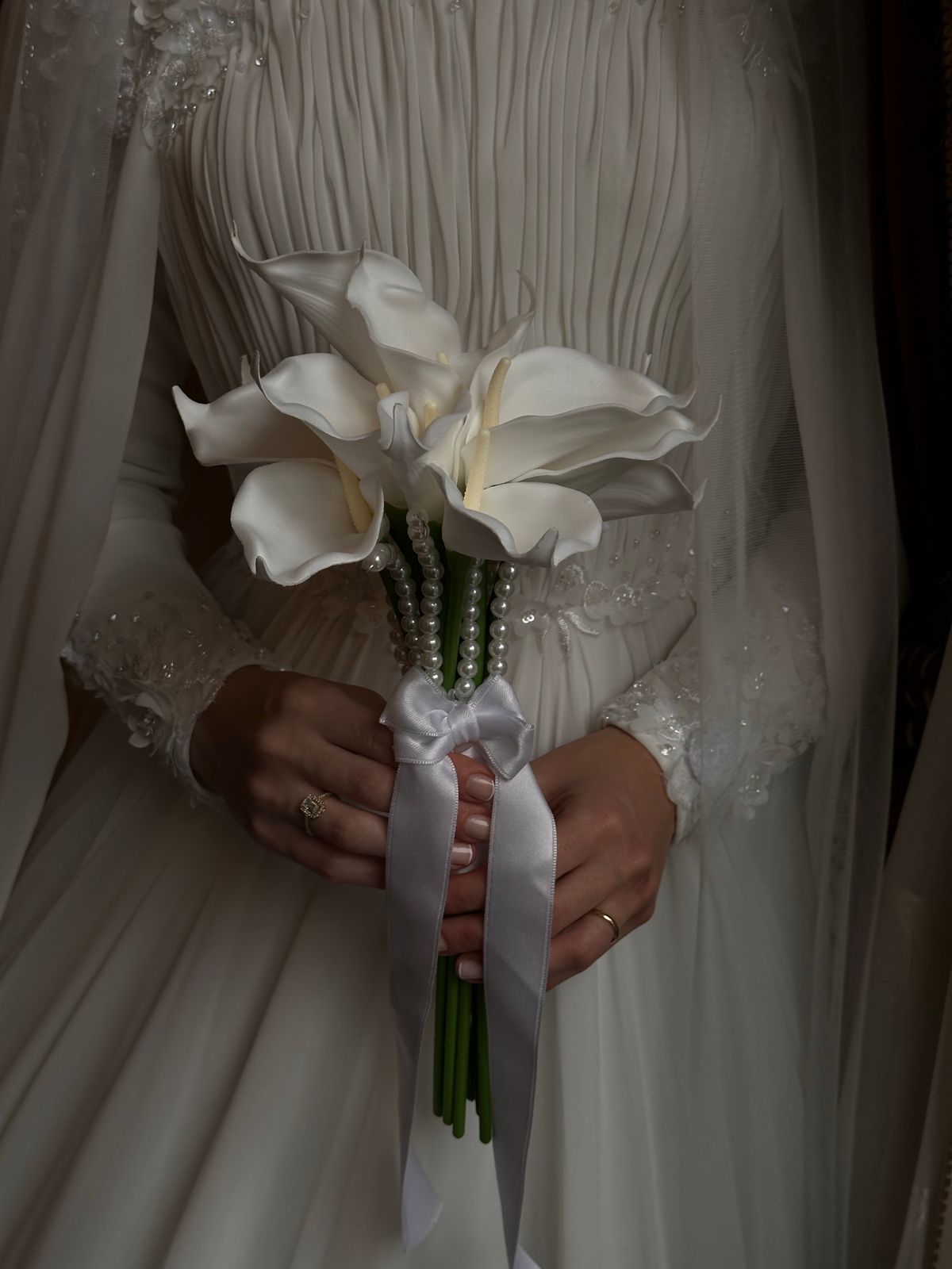 A bridal bouquet of white lilies